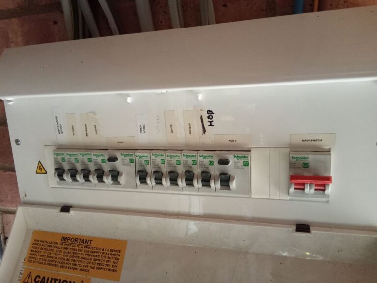 Existing consumer unit inspected before the new lighting circuits were added