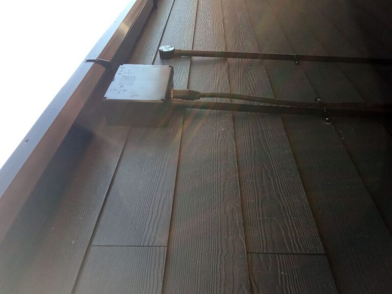 Armoured supply cable brought up inside the garden room wall build