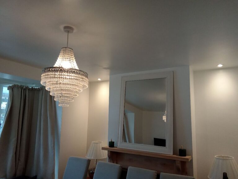 Lounge chandelier and downlights on the rewired lighting circuit