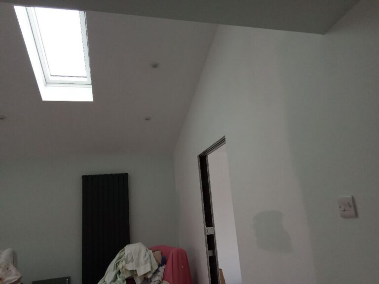 Spotlights and heating in the finished vaulted room